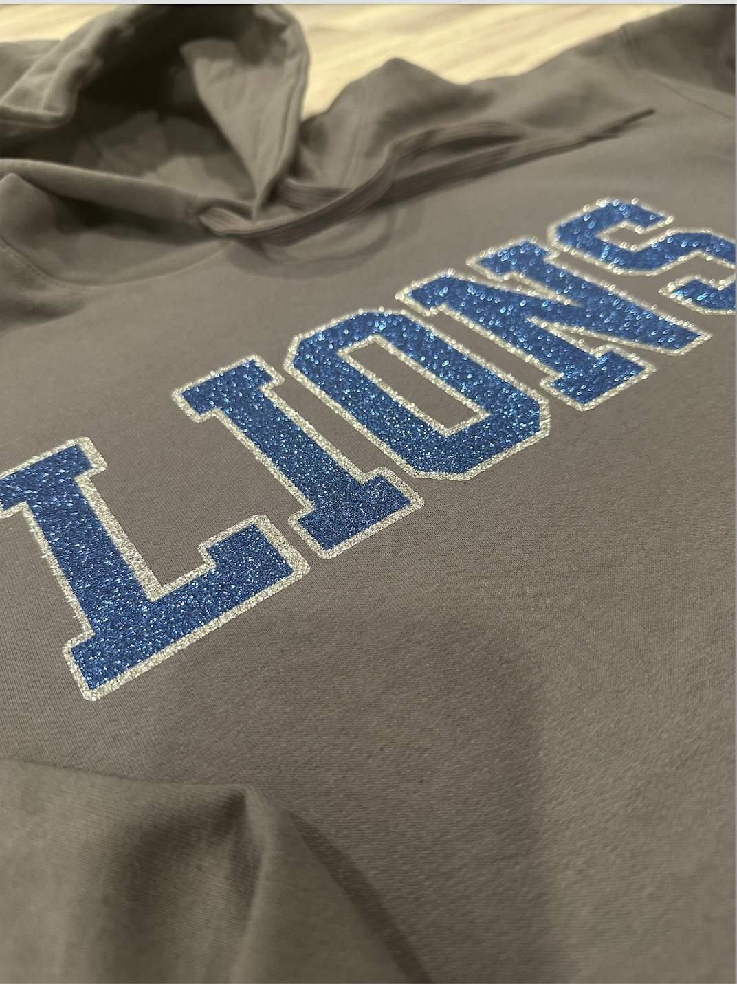 Chaos-Collection-Lions-Sparkle-charcoal