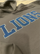 Chaos-Collection-Lions-Sparkle-charcoal